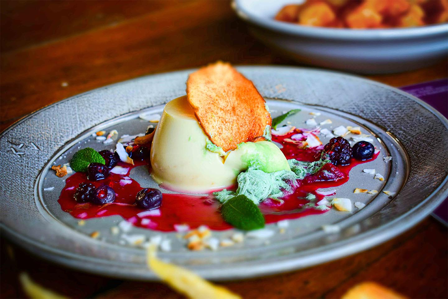 Panna Cotta with Poached Berries Palazzo Panna Cotta dessert served with Poached Berries